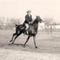 Man_riding_horse_small_square