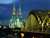 Cologne_cathedral_and_hohenzollern_bridge,_cologne,_germany1_tiny