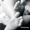 Fouth child baby feet small square